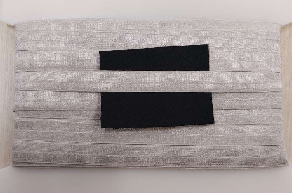 Elastisch omvouw glimmend breed 37