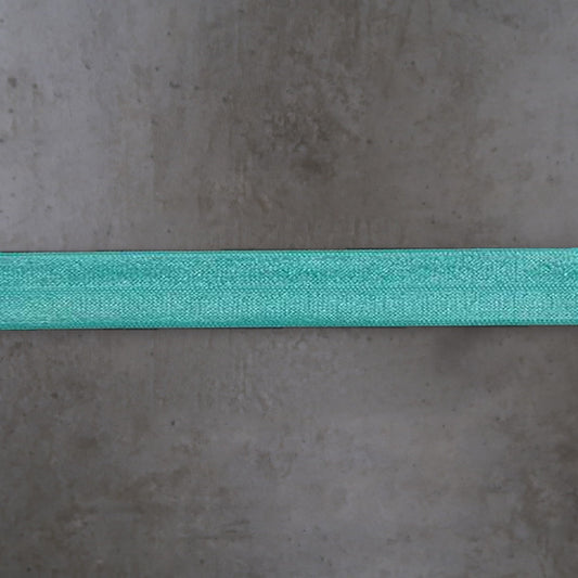 Elastisch Omvouw Glimmend Turquoise Soys Kantjeboord